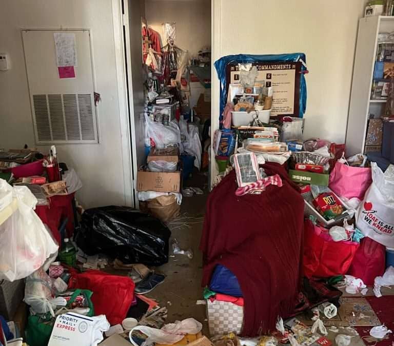 hoarder writ of possession requiring junk removal in Round Rock