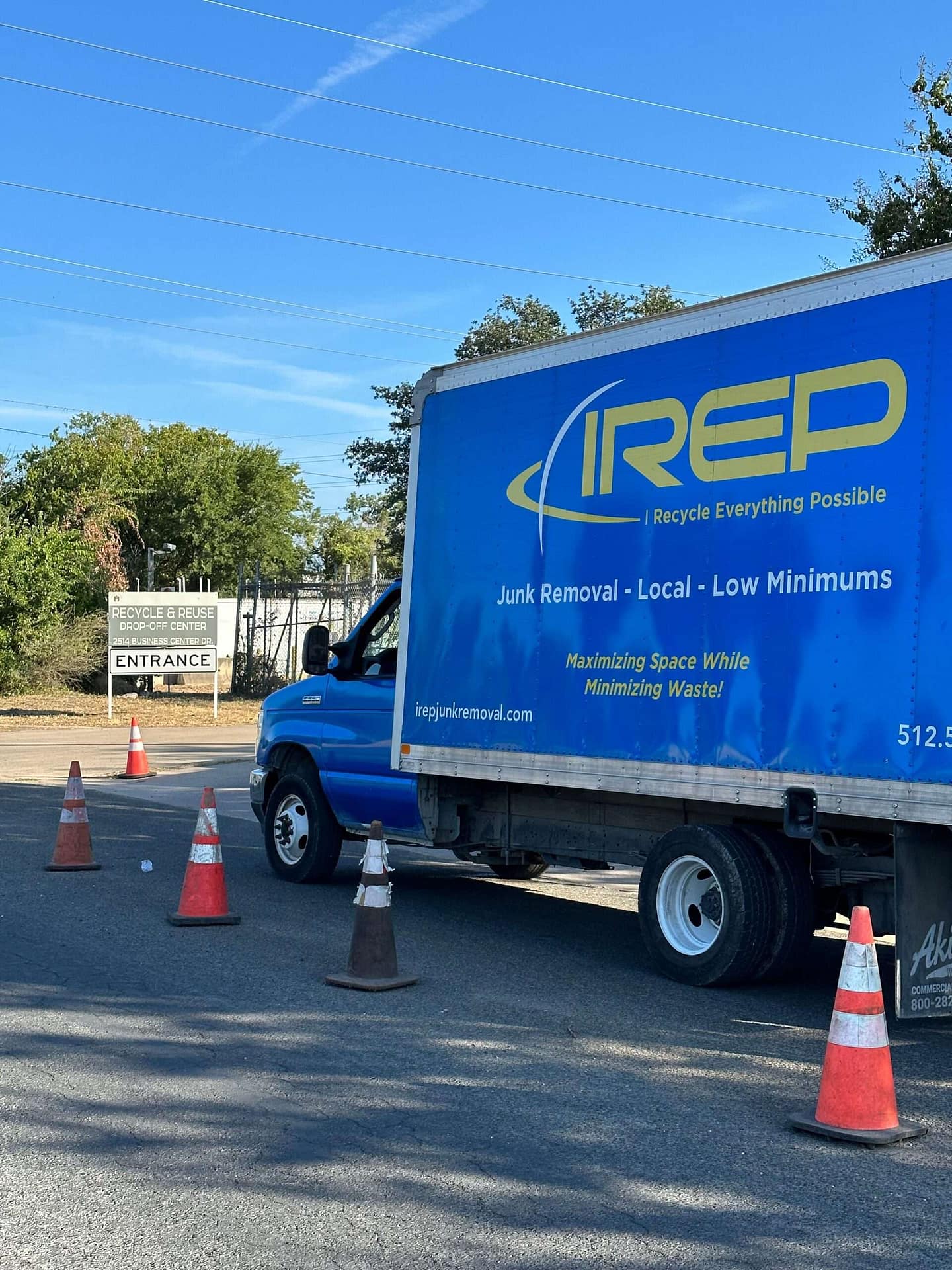 IREP Junk Removal truck waits outside Austin Resource Recovery Recycling and Reuse drop-off center in Austin, TX to help fulfill junk removal company mission