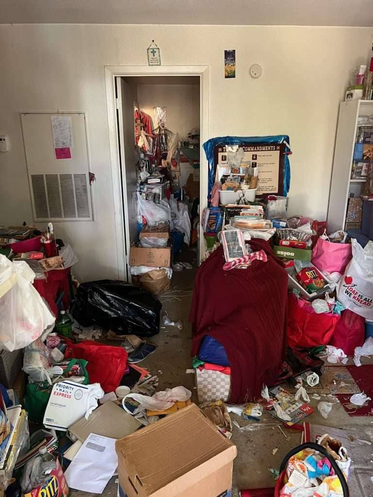 hoarder writ of possession requiring junk removal in Round Rock
